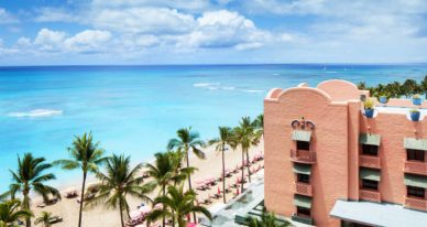 bird's-eye view photography of resort in front of beach