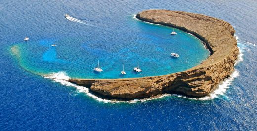bird's eye photography of c-formed island