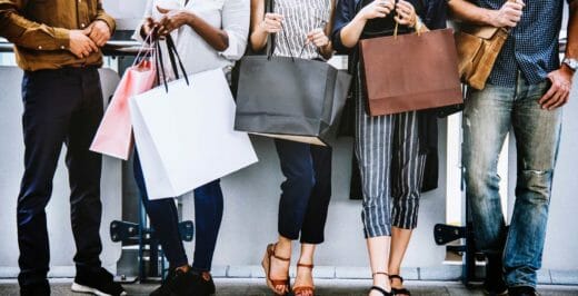 fiver people standing near wall