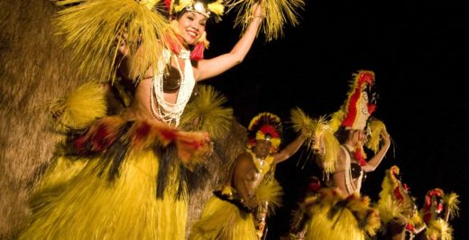 group of people dancing Hawaiian during nighttime